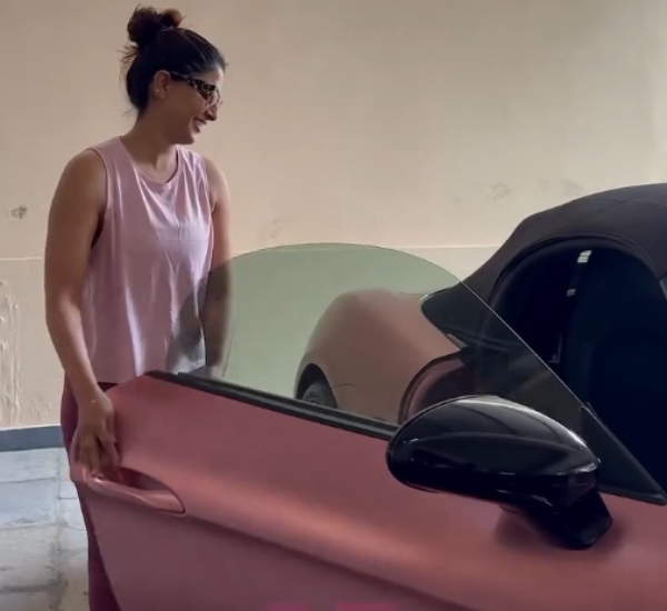 actress varalakshmi receives porsche 718 boxster sports car