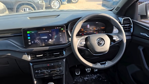 skoda kushaq facelift mid-variant at dealership showroom