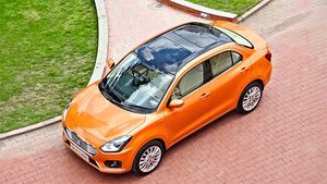 రెండు సన్‌రూఫ్‌లు మరియు సరికొత్త సన్‌సెట్ ఆరెంజ్ కలర్‌లో మారుతి డిజైర్..!