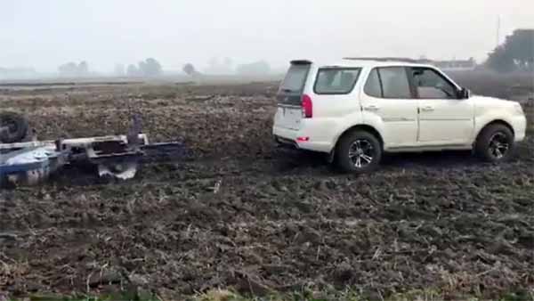 లక్షలు విలువ చేసే ఎస్‌యూవీలతో పొలాలు దున్నుతున్న రైతులు