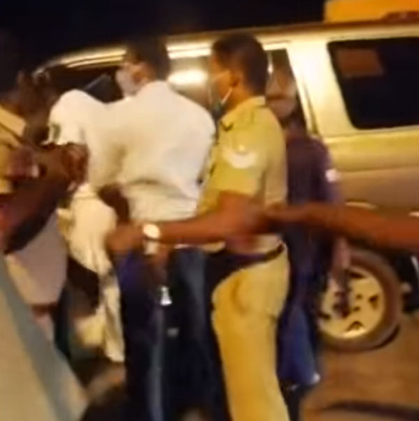 విధి నిర్వహణలో ఉన్న పోలీసును తన్నిన మాజీ MP