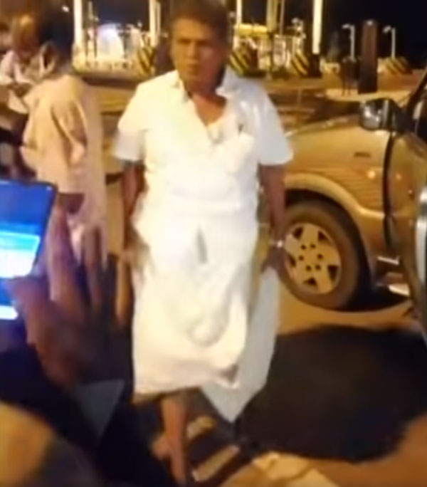 విధి నిర్వహణలో ఉన్న పోలీసును తన్నిన మాజీ MP