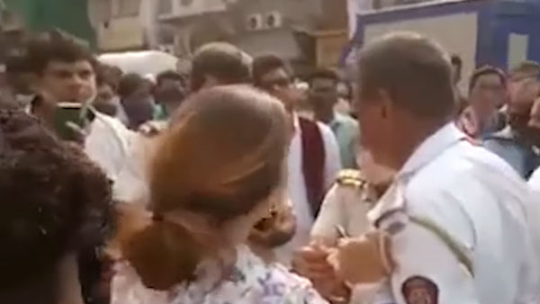 నడి రోడ్డుపై పోలీస్ చెంప చెళ్లుమనిపించిన మహిళ.. ఎందుకో తెలుసా