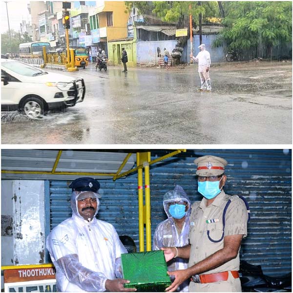 కురిసే వర్షంలో నిలబడి 4 గంటలు డ్యూటీ చేసిన పోలీస్.. ఎక్కడో తెలుసా ?