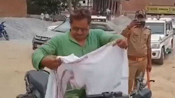 శభాష్ పోలీస్; లాక్‌డౌన్‌లో బయటకు వచ్చిన రాజకీయ నాయకుడికి రూ. 11,000 జరిమానా