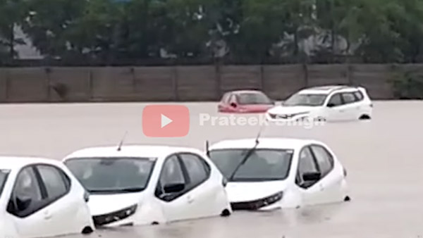 వర్షపు నీటిలో చిక్కుకున్న డెలివరీకి సిద్ధంగా ఉన్న టాటా కార్లు; ఎక్కడంటే?