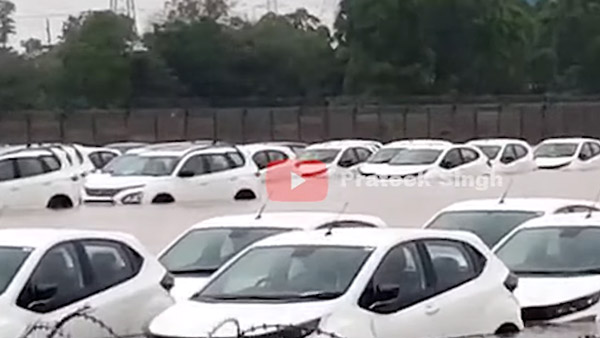 వర్షపు నీటిలో చిక్కుకున్న డెలివరీకి సిద్ధంగా ఉన్న టాటా కార్లు; ఎక్కడంటే?