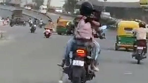 Couple-Romance-On-Bike Couple-Romance-On-Bike