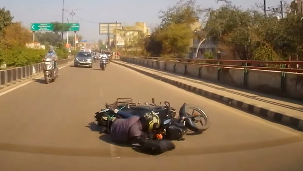 Bajaj pulsar rider crashed into rear of the car 