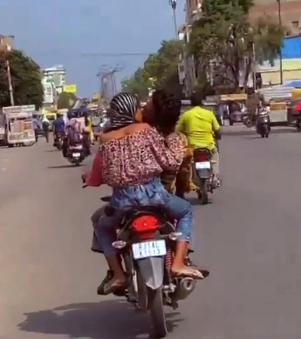 Young couple romance on Moving bike in jaipur