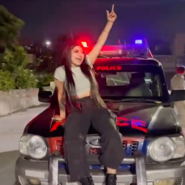 social media influencer doing reels on police vehicle social media influencer doing reels on police vehicle