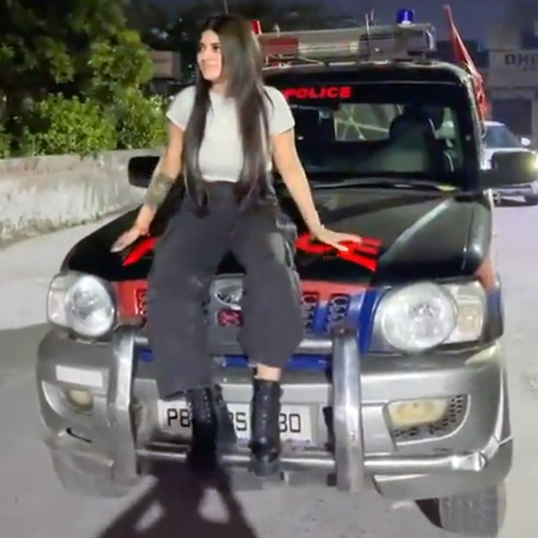 social media influencer doing reels on police vehicle social media influencer doing reels on police vehicle