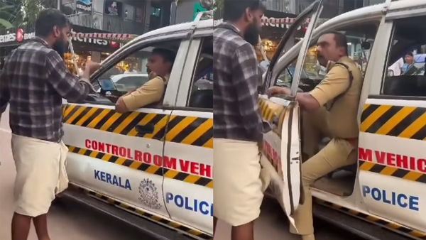 Man-Stopped-Police-Vehicle-For-Not-Wearing-Helmet Man-Stopped-Police-Vehicle-For-Not-Wearing-Helmet