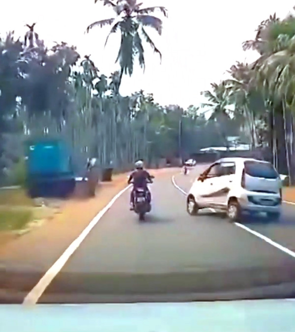 Tata nano car loses control and hits coconut tree