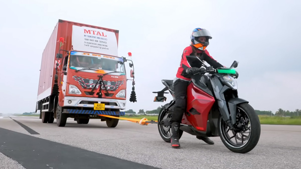 Ultraviolette-F77-Electric-Bike-Pulling-Bus-And-Truck