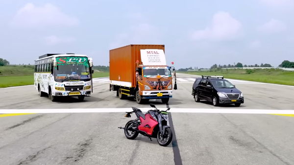 Ultraviolette-F77-Electric-Bike-Pulling-Bus-And-Truck