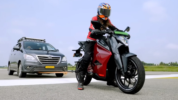 Ultraviolette-F77-Electric-Bike-Pulling-Bus-And-Truck