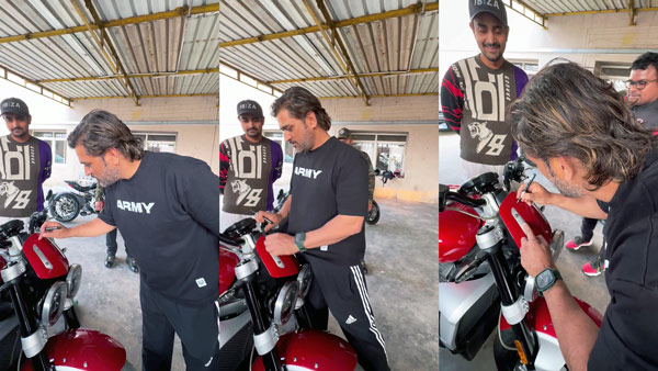 MS-Dhoni-Cleans-Fans-Bike