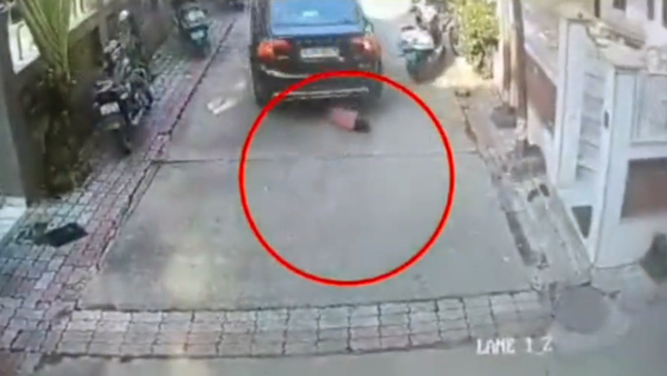 child survives after being runs over by car child survives after being runs over by car