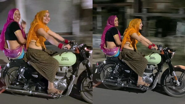 traditionally dressed woman drives royal enfield bike traditionally dressed woman drives royal enfield bike