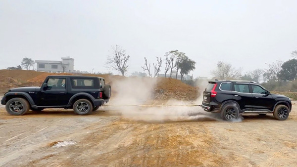 mahindra that and scorpio n cars race