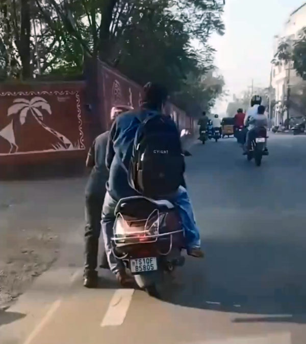 Rapido-Bike-Rider-Forced-To-Push-Bike