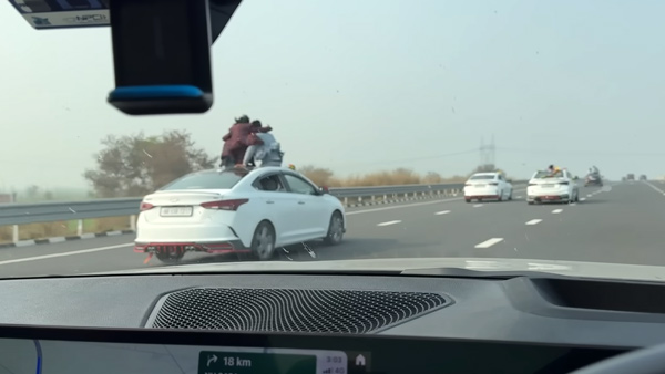 Bride Standing Out Of Moving Hyundai Verna Car Sunroof
