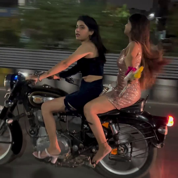 Girls Riding Royal Enfield Bullet in High Heels