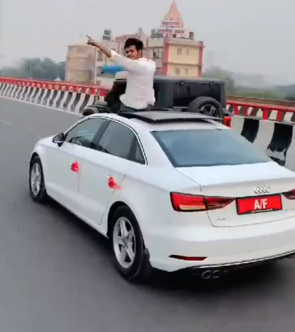 Stunts-On-Moving-Audi-Car