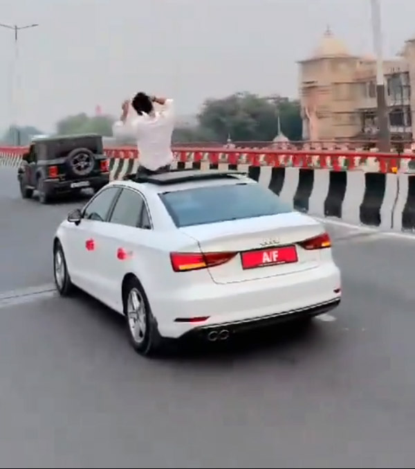 Stunts-On-Moving-Audi-Car