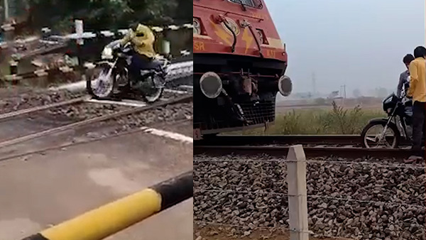 Man Ride Bike Towards a Running Train in Telangana Man Ride Bike Towards a Running Train in Telangana