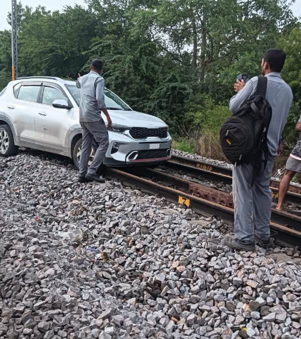 Woman Drives Car On Railway Track Viral News
