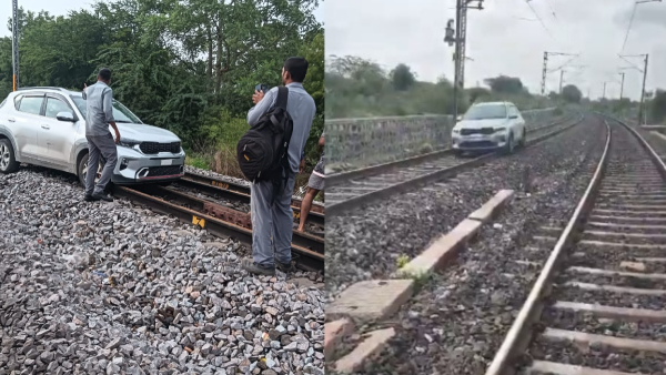 Woman Drives Car On Railway Track In Telangana