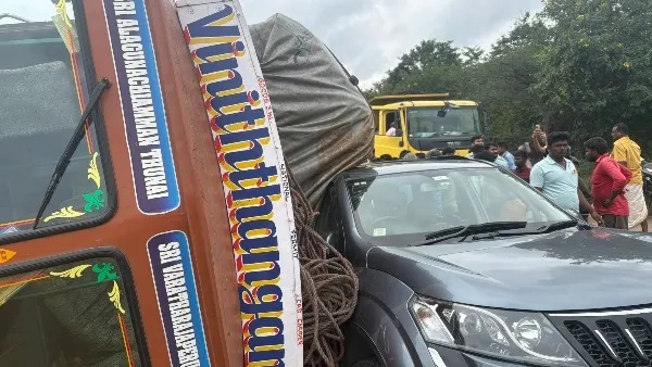 Survived Even After a Lorry Fell On It The Mahindra Car Saved Those in a Maruti Car Like a God