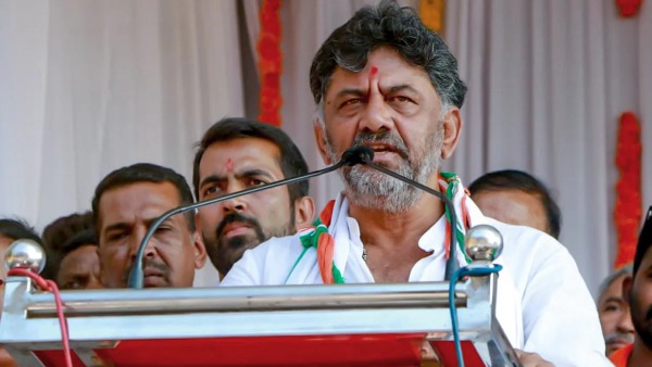 karnataka politics dk shivakumar assets own only one toyota qualis car details telugu